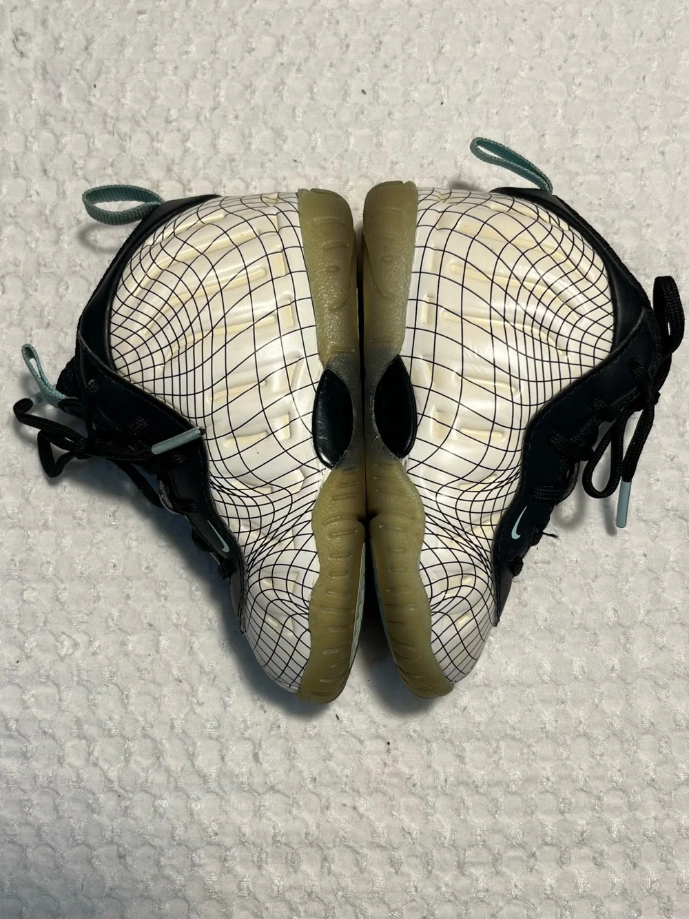 Nike Baby Black and White Grid Wrapped Sneakers with Teal Accents